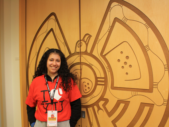 A Learning Skills Services Peer stands in the Centre for Indigenous Student Services office. 