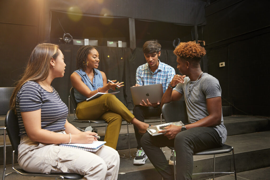 A group of students engaging in conversation