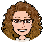 Cartoon image of woman with glasses and brown curly hair.