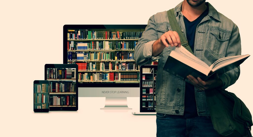 student flipping a page of a book with various devices in the background displaying virtual book shelves
