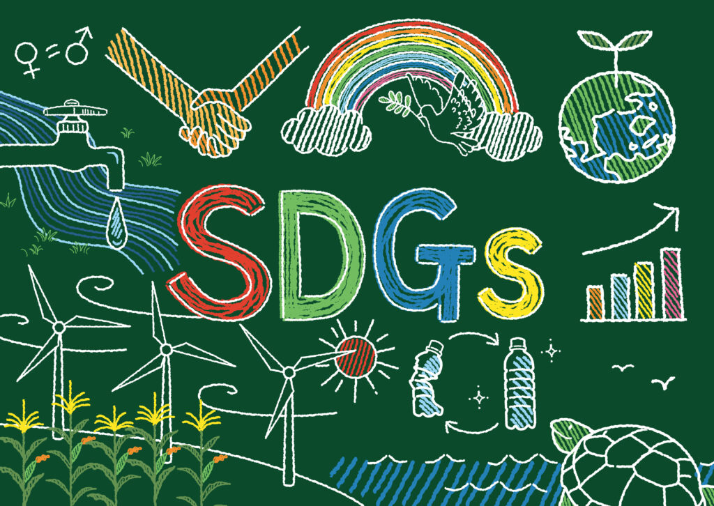this is a decorative image with a green background and pictures drawn in multicoloured chalk of the SDGs