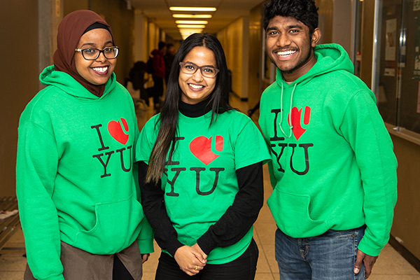 three people standing together