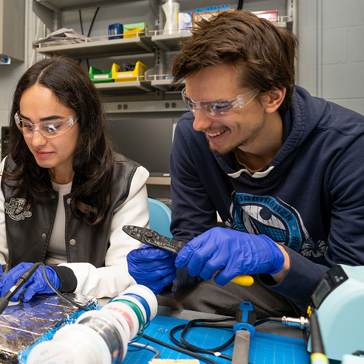 Research students in a lab.