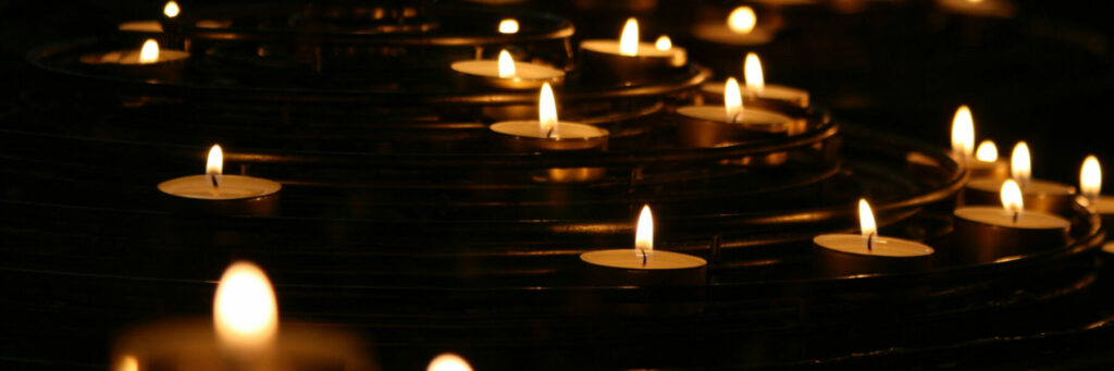 Candles burning in the dark