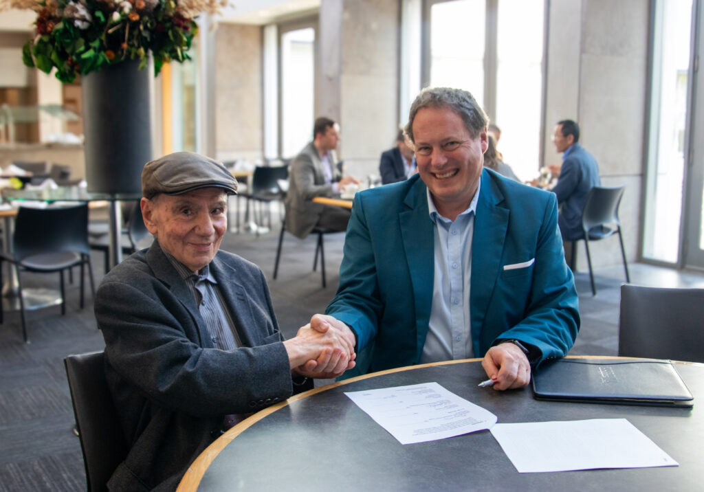 Hedi Bouraoui and Faculty of Liberal Arts & Professional Studies Dean J.J. McMurtry during the gift announcement