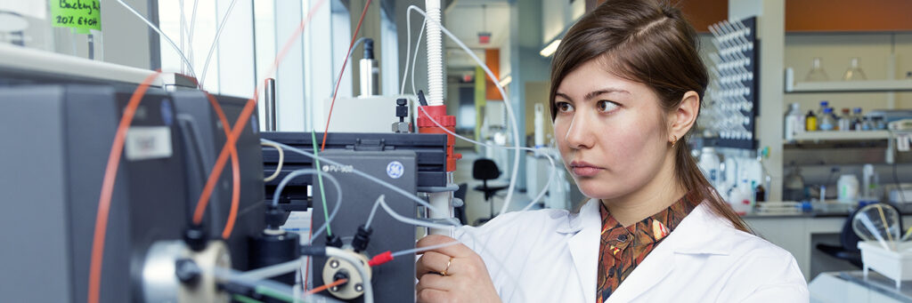 A female scientist researcher working in a lab