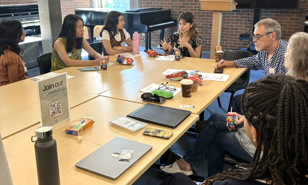 Mahnoosh leads a discussion on the role of pollinator seeds in sustaining ecosystems during The Nest’s Opening Circle.