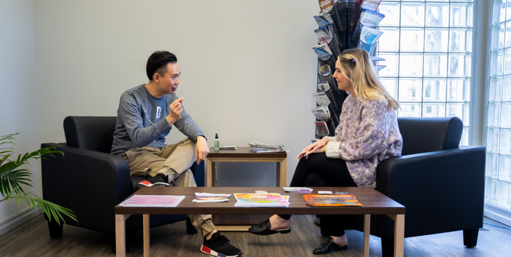 Two entrepreneurs sitting and chatting.