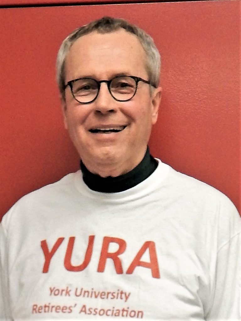 Photo of John Lennox, YURA Past Co-President, wearing a YURA volunteer t-shirt